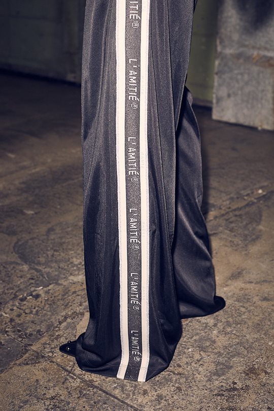 Haute L\' Amitié - Baggy Lurex Logo Tall Track Pants - Black